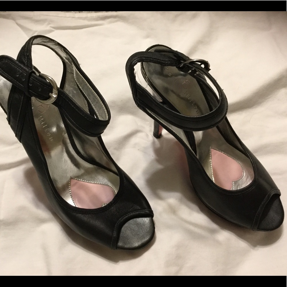 Paris Hilton black heels.